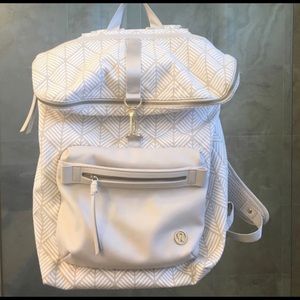 White and tan Lulu Lemon backpack